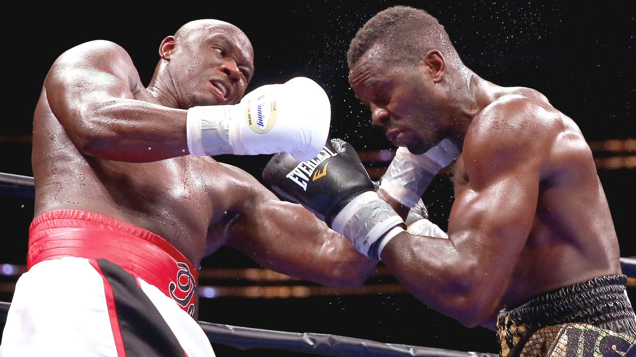 Five-time champ Tarver fights to draw with Cunningham